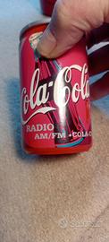 radio e borraccia coca cola 