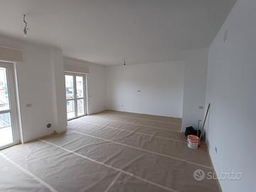 Appartamento Ristrutturato con Mansarda e Garage