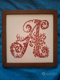 quadro con lettera A a punto croce