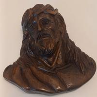 bassorilievo in legno intagliato