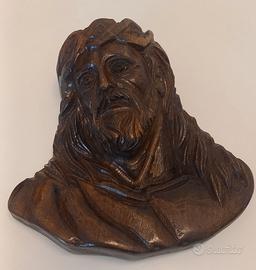 bassorilievo in legno intagliato