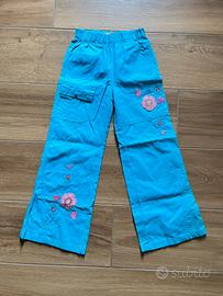 Pantaloni azzurri fiori rosa 10”% cotone bambina