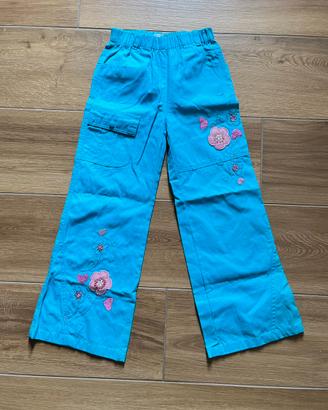 Pantaloni azzurri fiori rosa 10”% cotone bambina