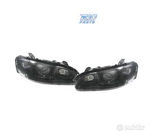FARI PER OPEL OMEGA 94-99 LENTE A LENTE NERA