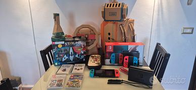 nintendo switch + 5 giochi + accessori