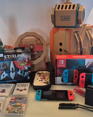 nintendo switch + 5 giochi + accessori