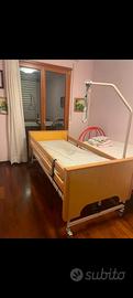 letto elettrico per anziani con  sponde 