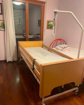 letto elettrico per anziani con  sponde 