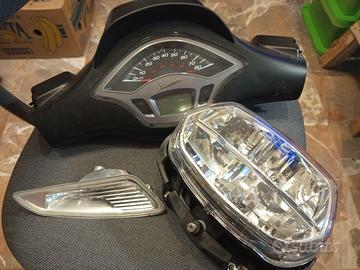 Cruscotto + fanale + freccia vespa sprint