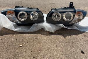 COPPIA FARI ANTERIORI BMW SERIE 1  CON ANGEL EYES