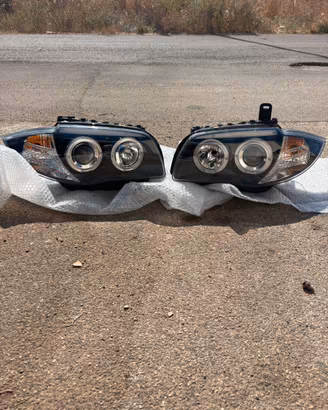 COPPIA FARI ANTERIORI BMW SERIE 1  CON ANGEL EYES