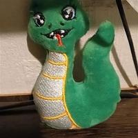 Serpente di peluche morbido e colorato