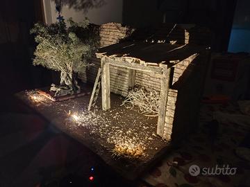 Presepe storico con illuminazione,albero di ulivo
