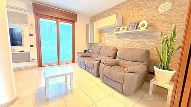 Villetta a schiera con giardino privato