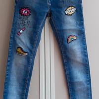 Jeans,  con scritta e stemmi   bambina 7 /9 anni