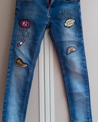 Jeans,  con scritta e stemmi   bambina 7 /9 anni