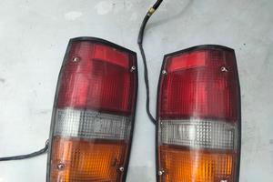 Fari posteriori pick up Mitsubishi 