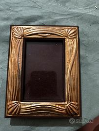 Cornicea in argento vintage