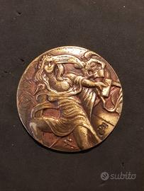 Medaglia su disegno di Salvador Dali'
