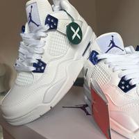 Jordan 4 bianche con dettagli viola metallico n.38