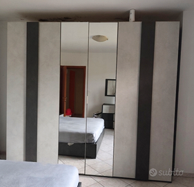 Camera da letto completa con letto contenitore
