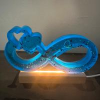 Infinito in resina con base led