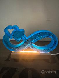 Infinito in resina con base led