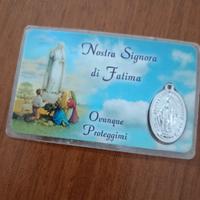 immagine madonna di Fatima plastificata con medagl