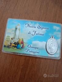 immagine madonna di Fatima plastificata con medagl