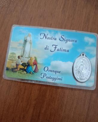 immagine madonna di Fatima plastificata con medagl