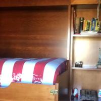 Camera da letto in legno massello