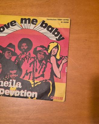 45 giri love me baby