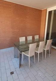 Tavolo acciaio e cristallo Cattelan