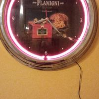 orologio pubblicitario al neon