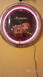 orologio pubblicitario al neon