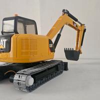 escavatore bruder R/C in scala 1/16 funzionante!