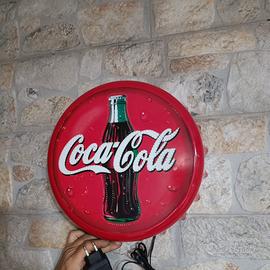 Insegna luminosa Coca-Cola