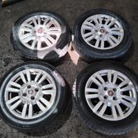4 cerchi lega e gomme fiat Punto 15P
