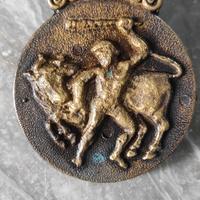 fermacarte rotondo antico in ottone 