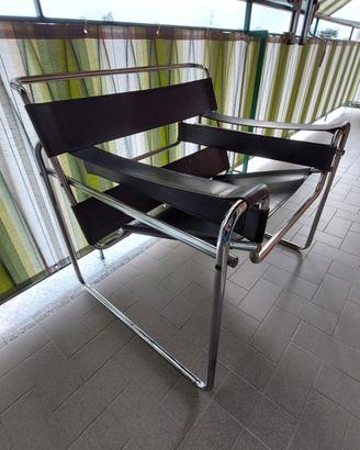 poltrona di design acciaio e cuoio