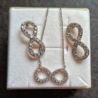 Parure collana e orecchini Infinito