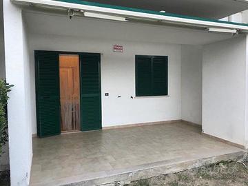 Appartamento con giardino villaggio Tucano