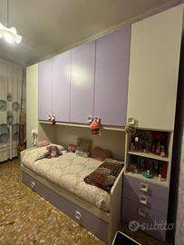 Letto a ponte con armadio e cassetti