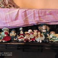 Bambole da collezione in porcellana nuove