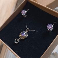 Parure collana e orecchini viola