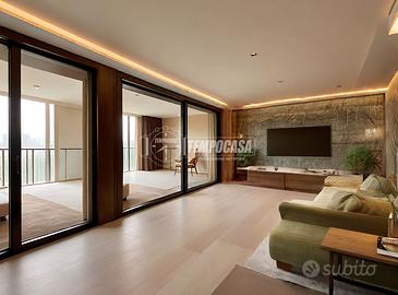 TRILOCALE ARREDATO CON DOPPI TERRAZZI - NUOVA COST