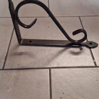 Reggimensola in ferro battuto ramato