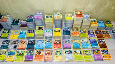 Lotto 100 carte pokemon con carta EX rara