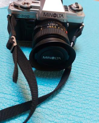 macchina fotografica Minolta, con obviettivo