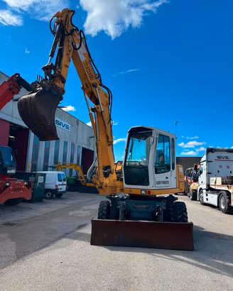 Escavatore gommato liebherr 308 triplice del 2000